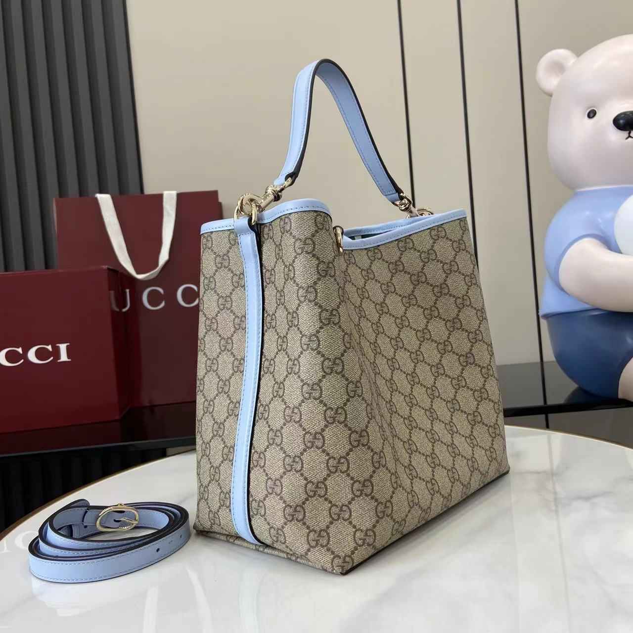 Gucci GG Emblem medium bucket bag ‎815103 in blue fabric