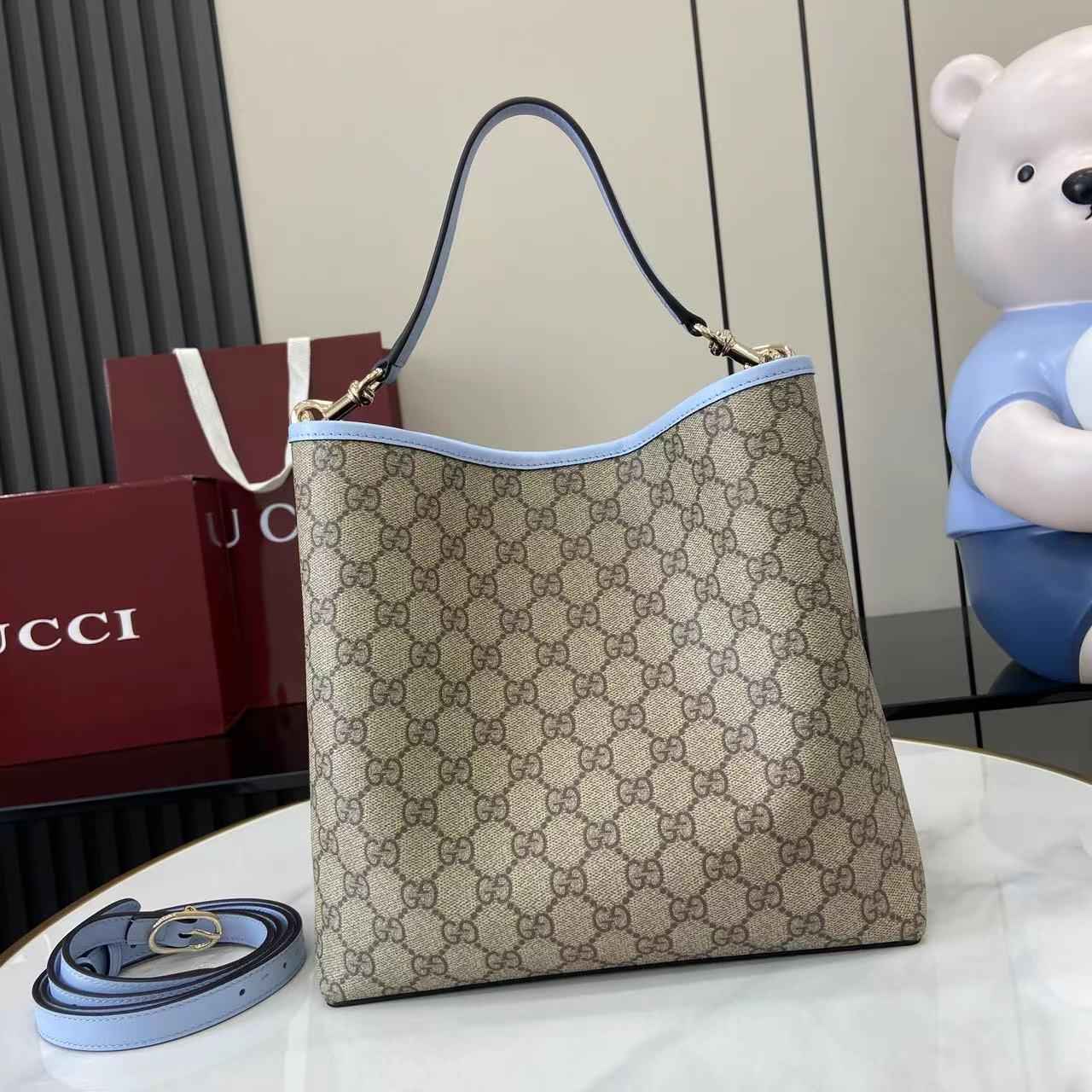 Gucci GG Emblem medium bucket bag ‎815103 in blue fabric