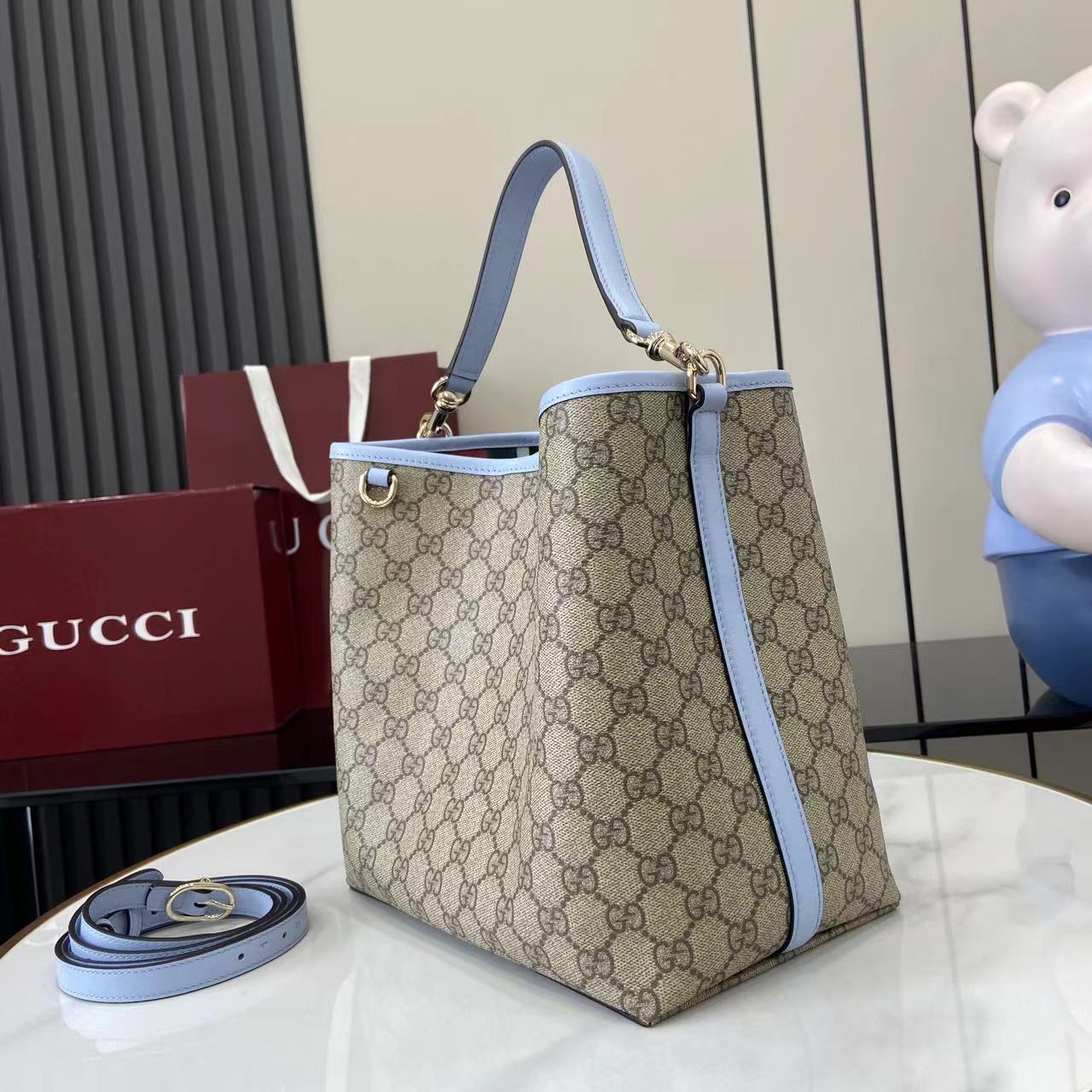 Gucci GG Emblem medium bucket bag ‎815103 in blue fabric