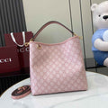 Gucci GG Emblem medium bucket bag ‎815103 in pink fabric