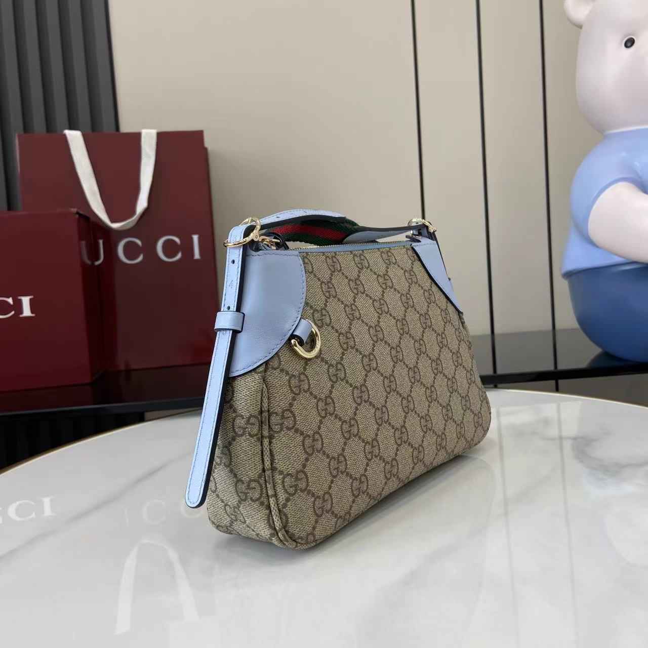 Gucci GG Emblem small shoulder bag 815218 in blue fabric