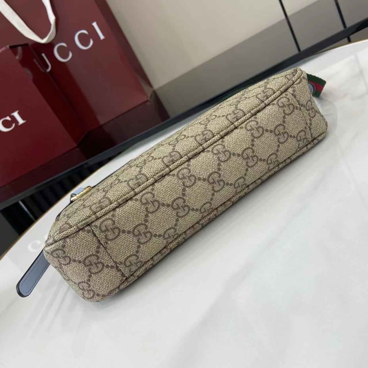 Gucci GG Emblem small shoulder bag 815218 in blue fabric