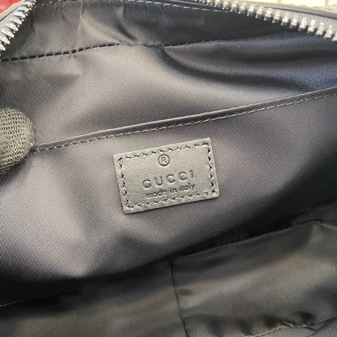 Gucci GG Emblem small toiletry case, ‎821164 in black fabric