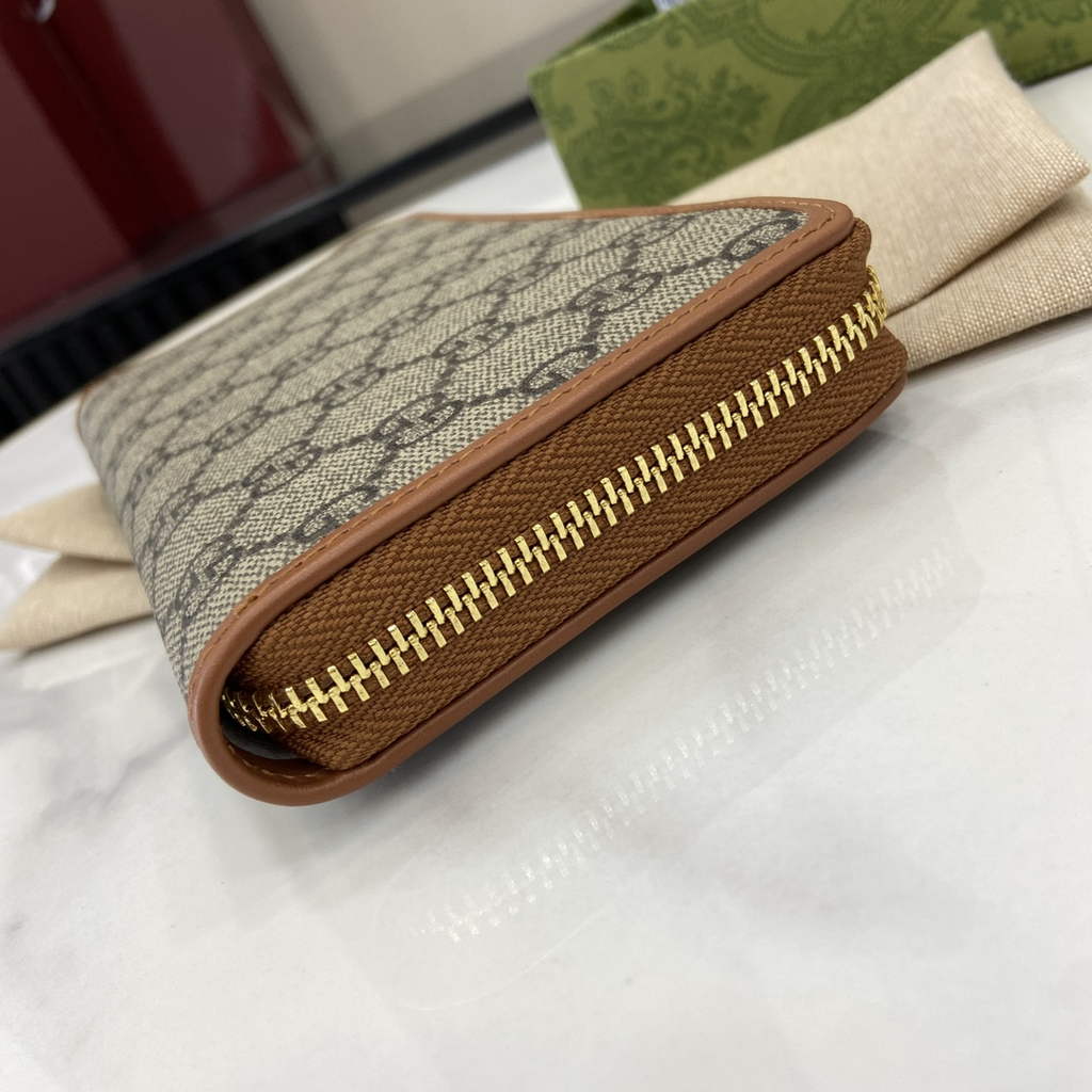Gucci GG Emblem zip around wallet, 821803 in brown fabric