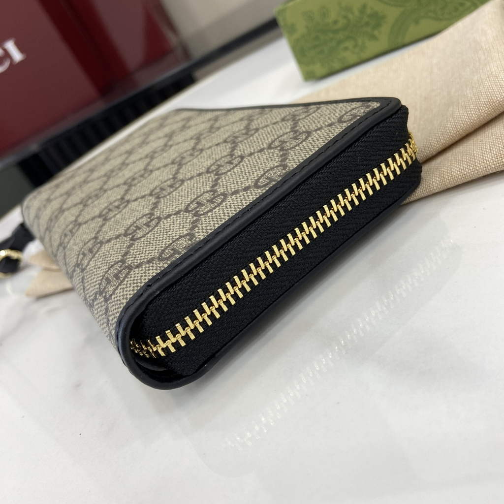 Gucci GG Emblem zip around wallet, 821803 in black fabric