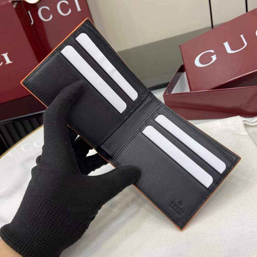 Gucci GG Marmont bi-fold wallet 835047 in Black orange leather