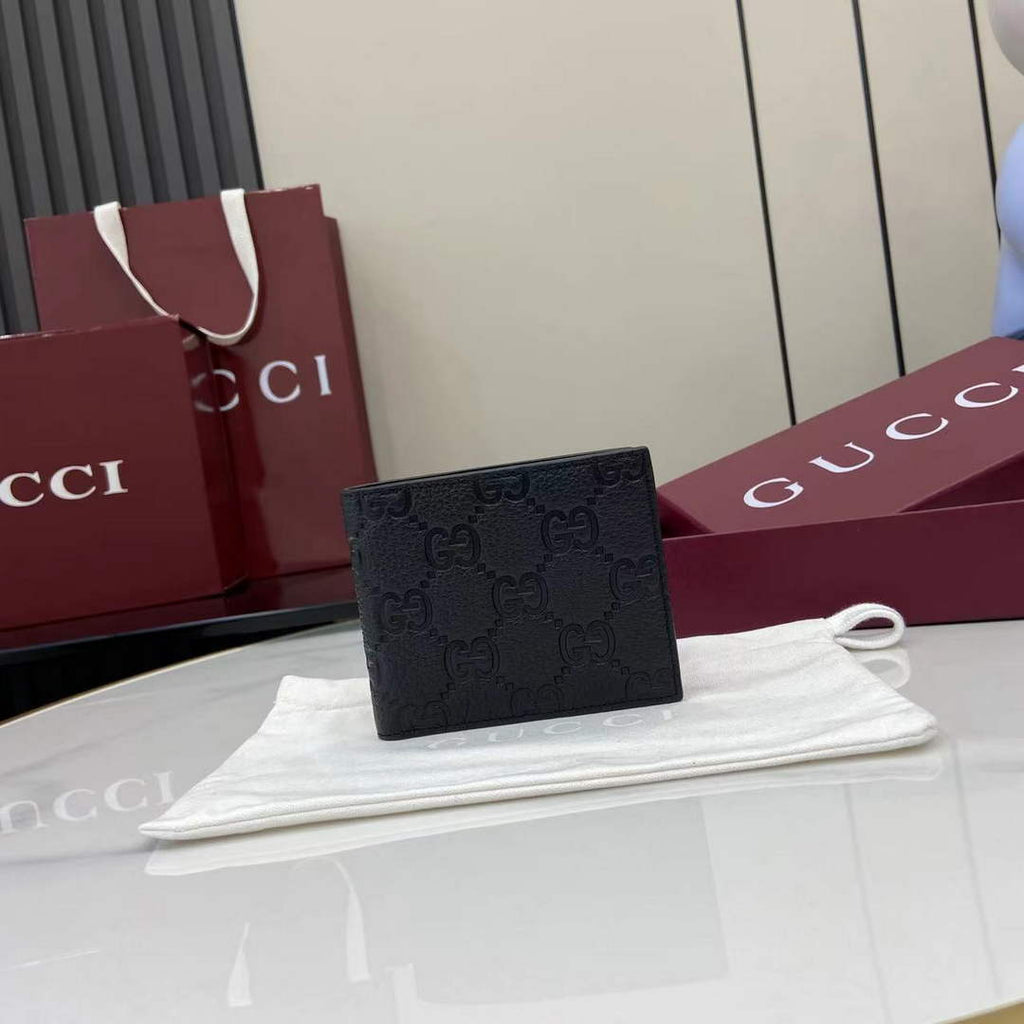Gucci Imprint bi-fold wallet - Black GG Leather 835001