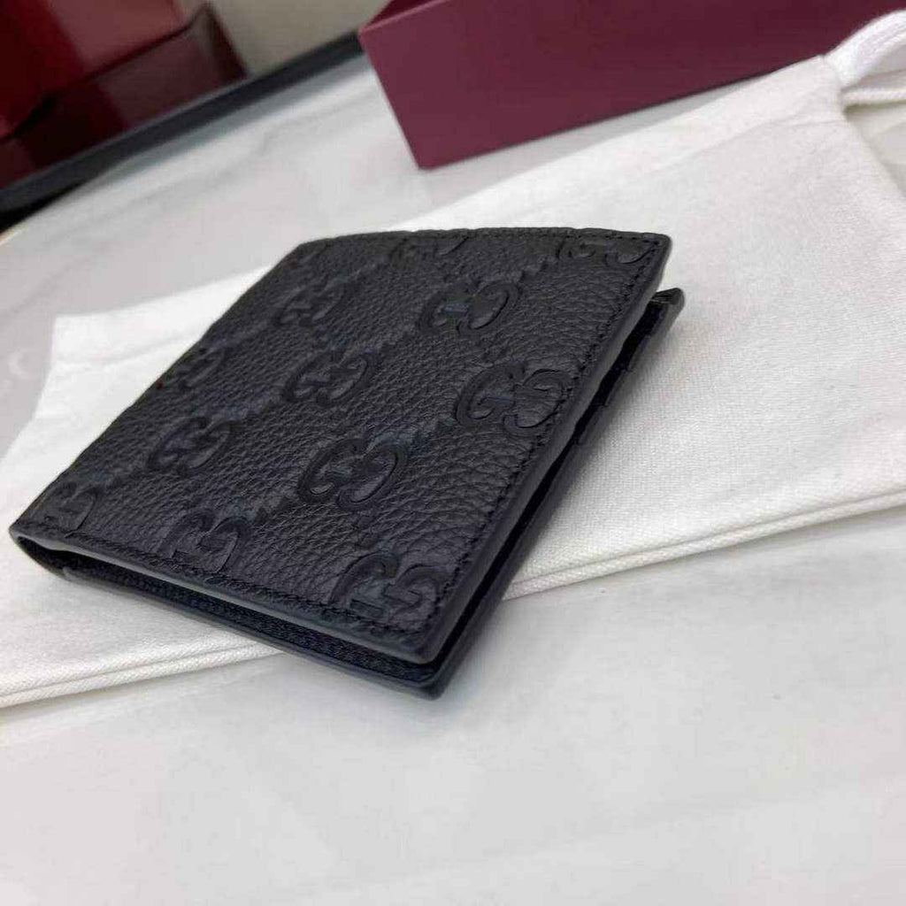 Gucci Imprint bi-fold wallet - Black GG Leather 835001