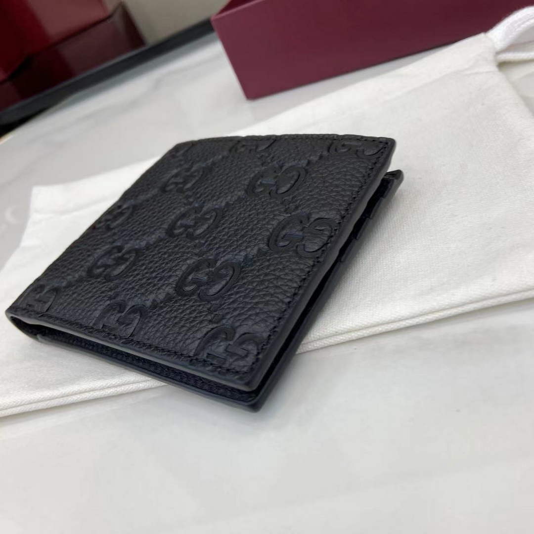 Gucci Imprint bi-fold wallet - Black GG Leather 835001