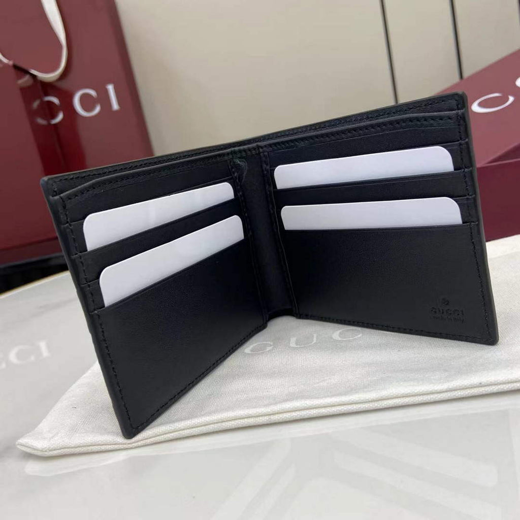 Gucci Imprint bi-fold wallet - Black GG Leather 835001