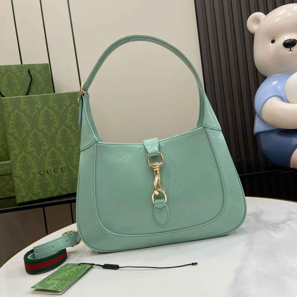 Gucci Jackie small shoulder bag in light blue patent leather 782849