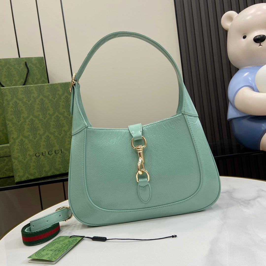 Gucci Jackie small shoulder bag in light blue patent leather 782849