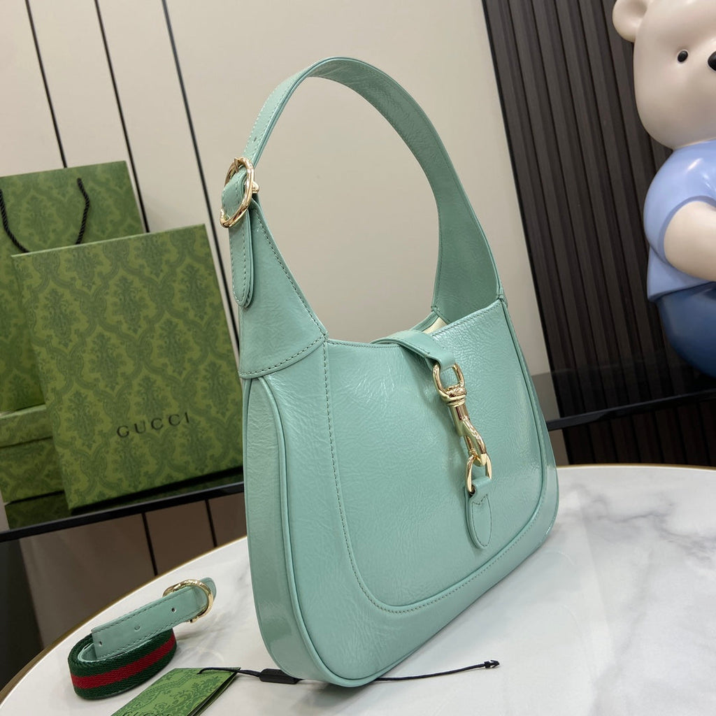 Gucci Jackie small shoulder bag in light blue patent leather 782849