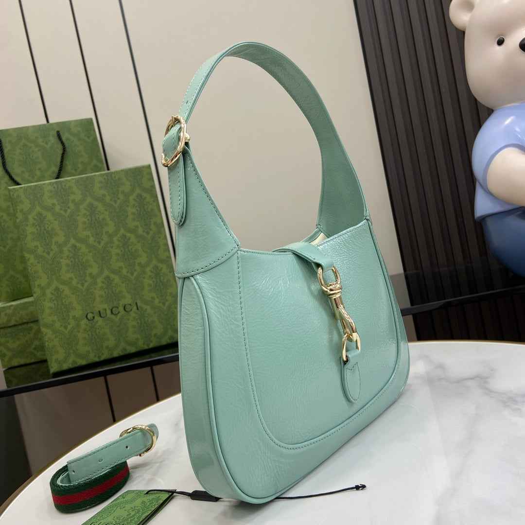 Gucci Jackie small shoulder bag in light blue patent leather 782849