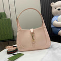 Gucci Jackie small shoulder bag in light pink patent leather 782849