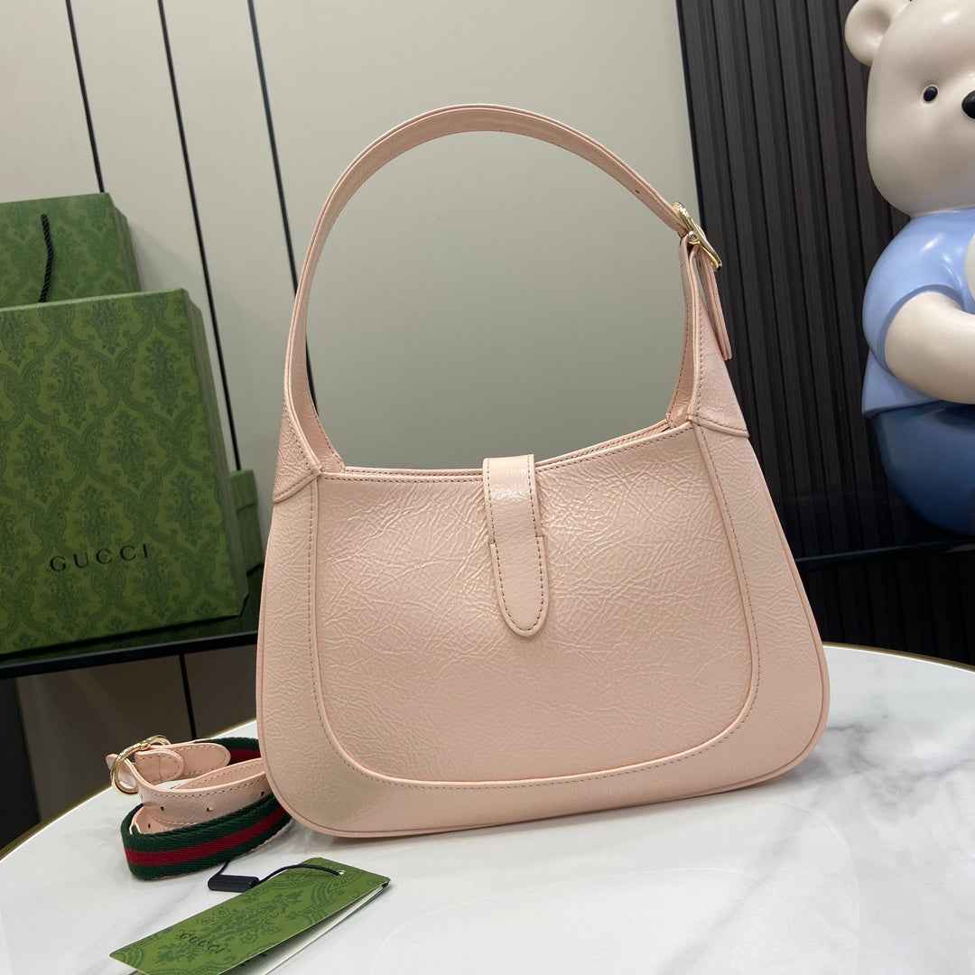 Gucci Jackie small shoulder bag in light pink patent leather 782849