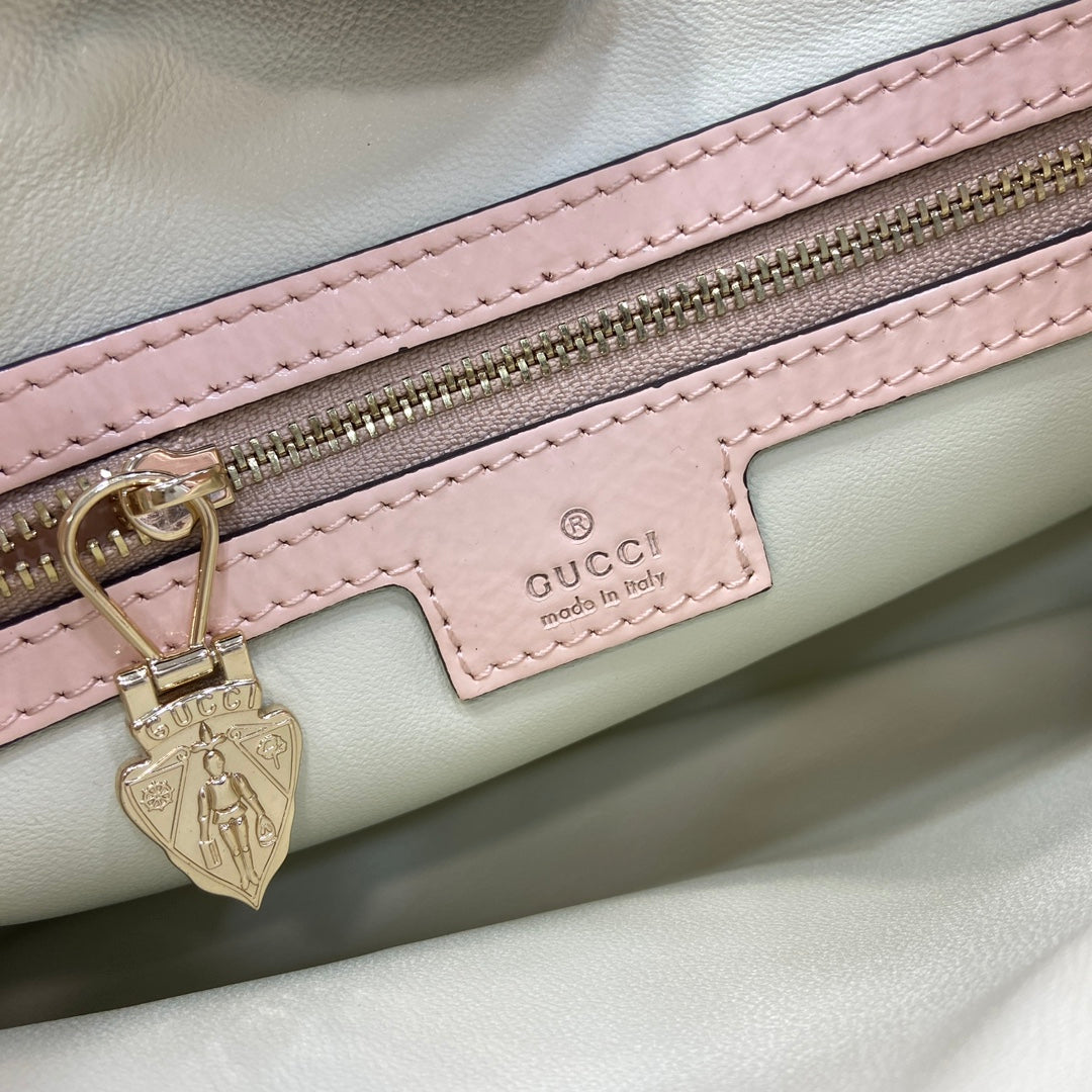 Gucci Jackie small shoulder bag in light pink patent leather 782849