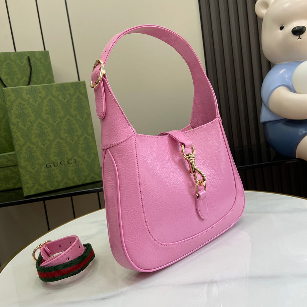 Gucci Jackie small shoulder bag in pink patent leather 782849