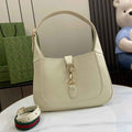 Gucci Jackie small shoulder bag in beige patent leather 782849