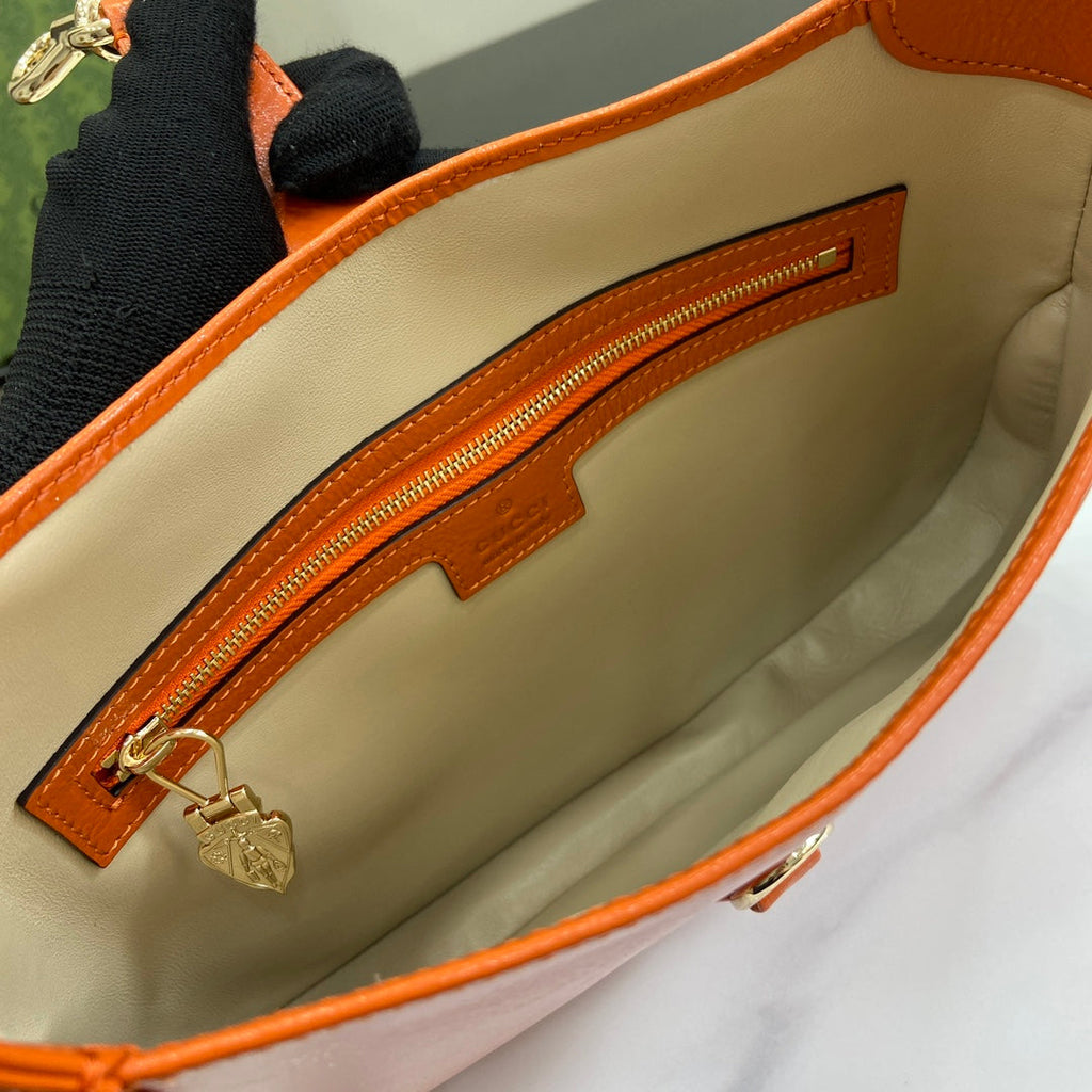 Gucci Jackie small shoulder bag in orange patent leather 782849