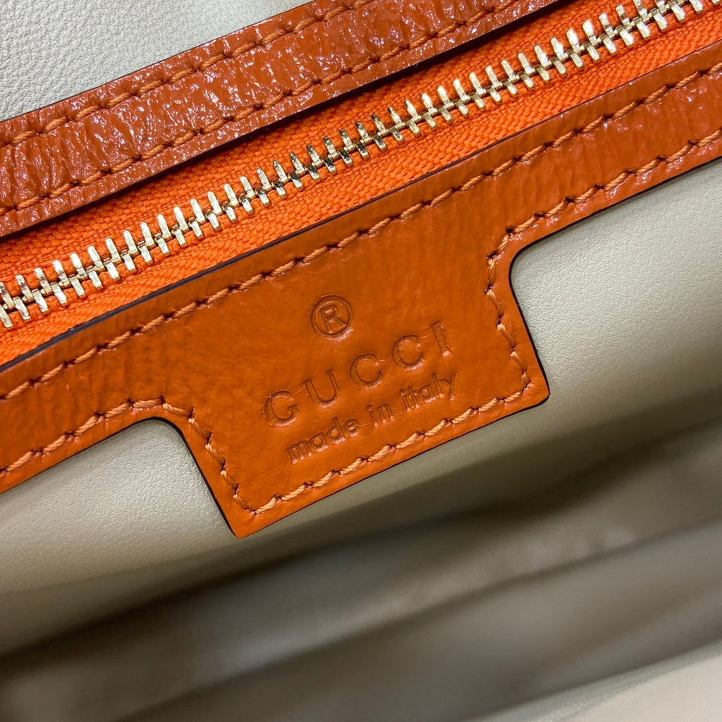 Gucci Jackie small shoulder bag in orange patent leather 782849