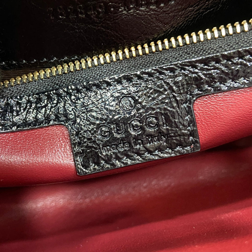 Gucci Jackie small shoulder bag in black patent leather 782849