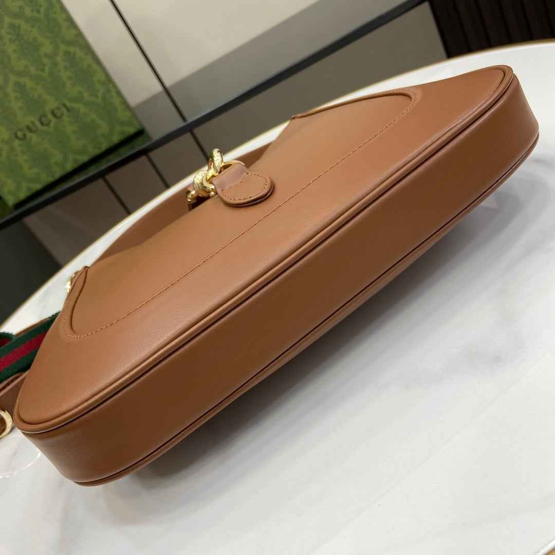 Gucci Jackie small shoulder bag in brown leather 782849