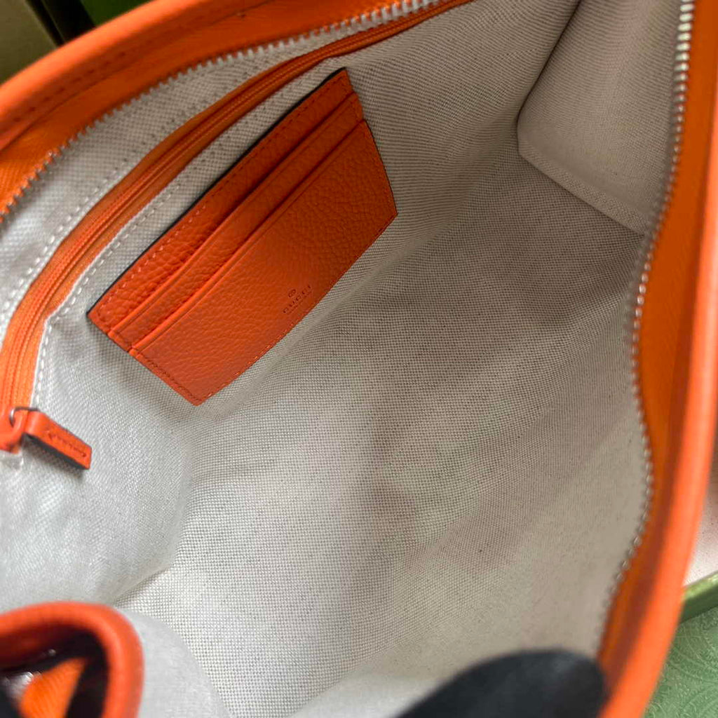 Gucci Jumbo GG pouch in black leather 739490 In Orange leather