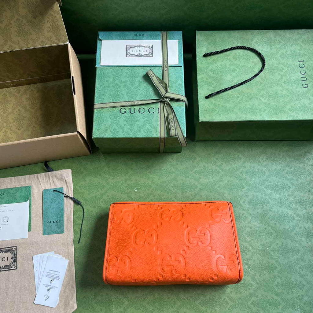 Gucci Jumbo GG pouch in black leather 739490 In Orange leather