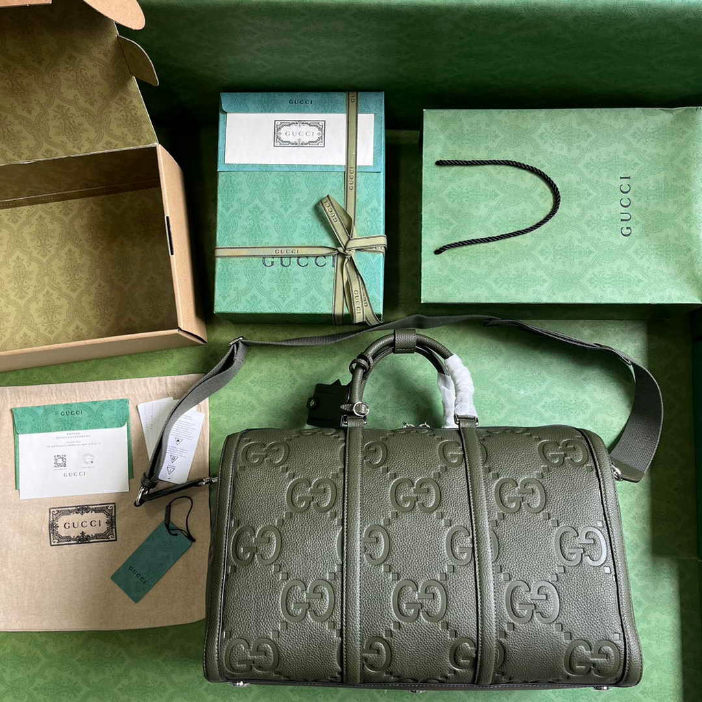 Gucci Jumbo GG small duffle bag ‎725282 in green leather