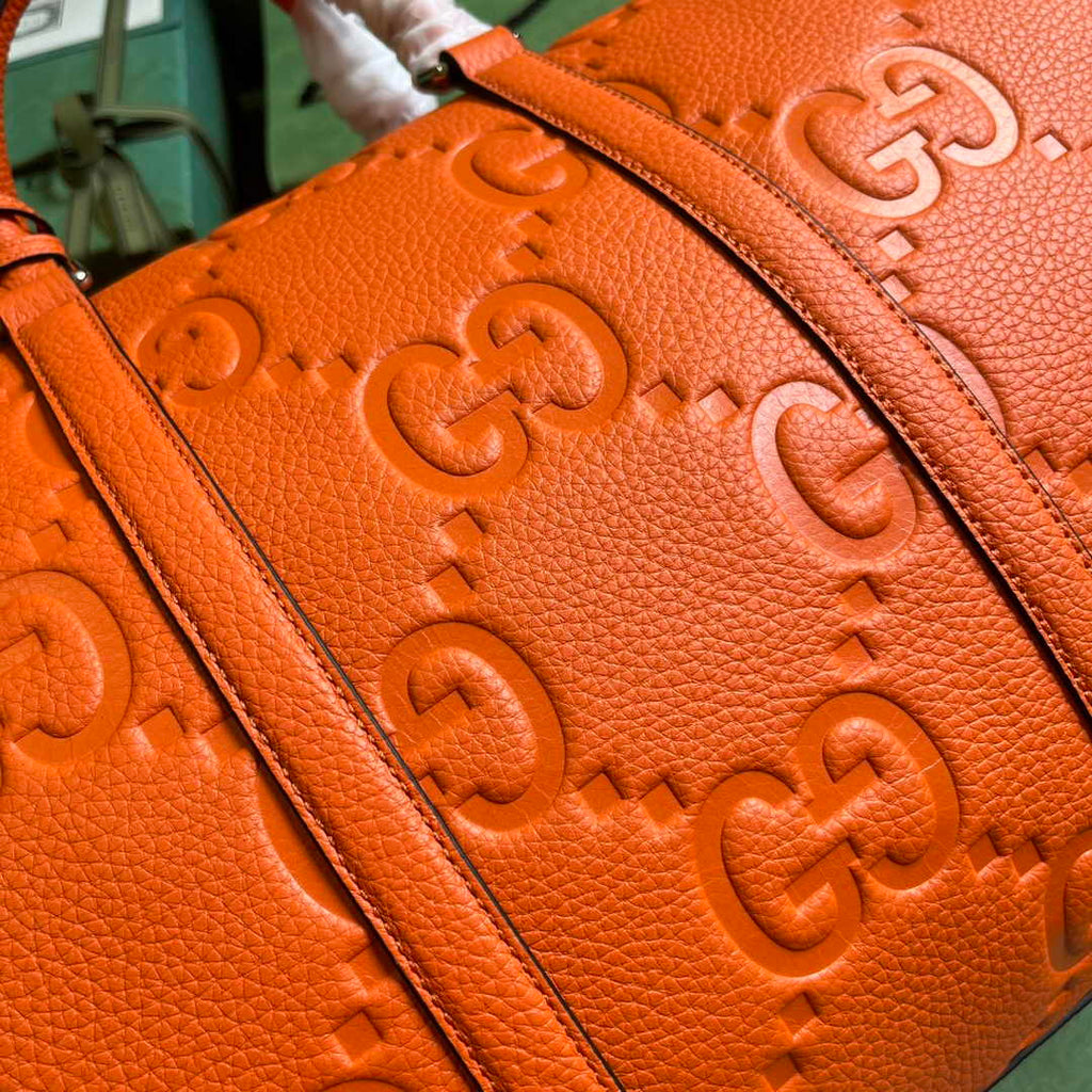 Gucci Jumbo GG small duffle bag ‎725282 in Orange leather