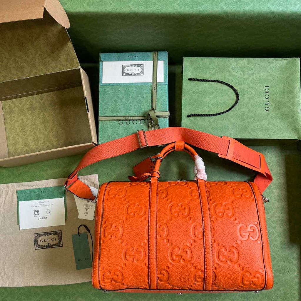 Gucci Jumbo GG small duffle bag ‎725282 in Orange leather