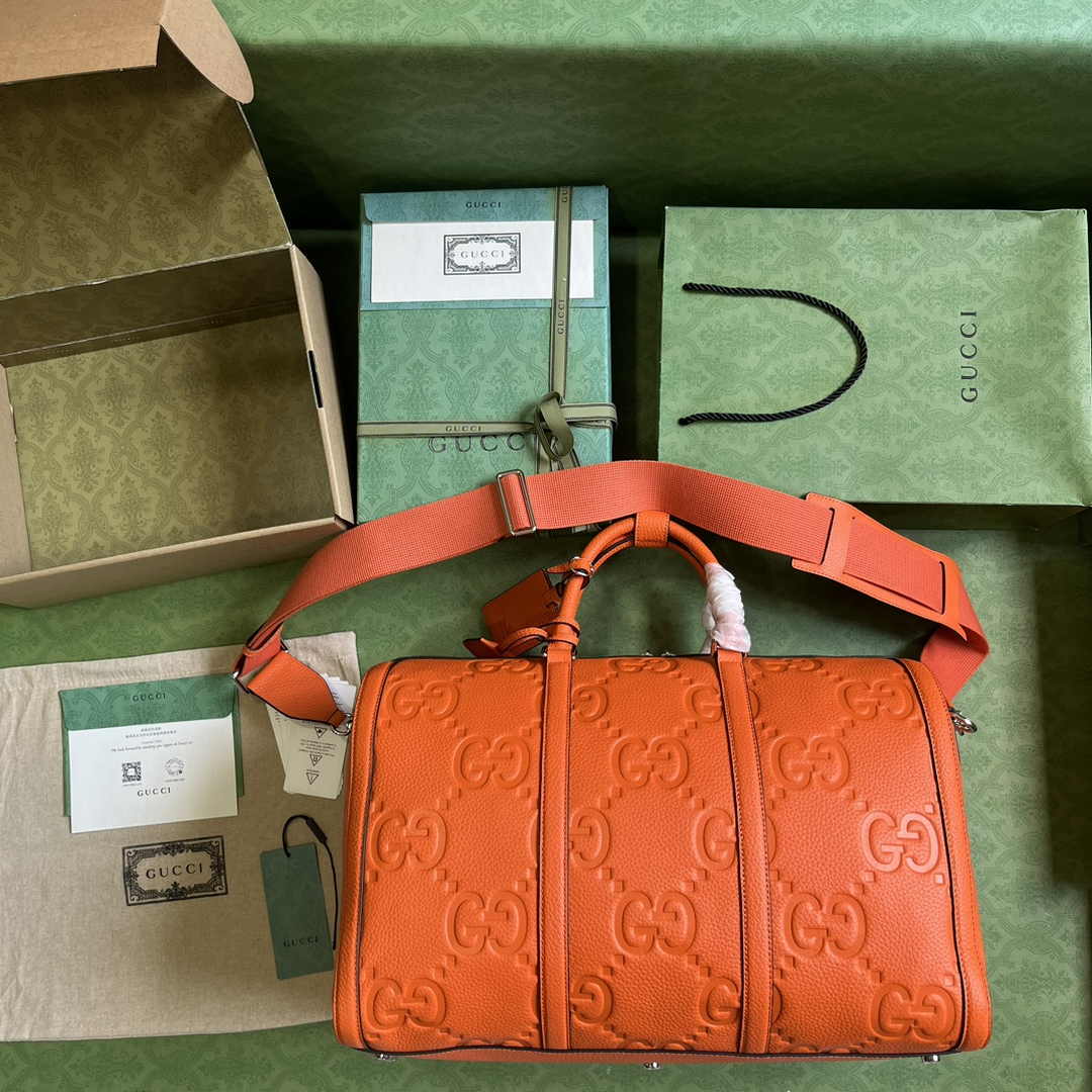 Gucci Jumbo GG small duffle bag ‎725282 in Orange leather