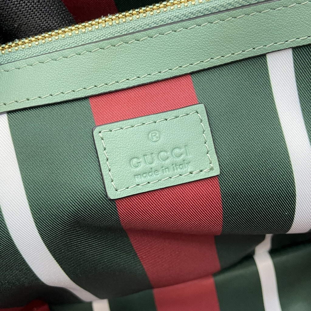 Gucci GG Emblem small bucket bag 815118 in green fabric