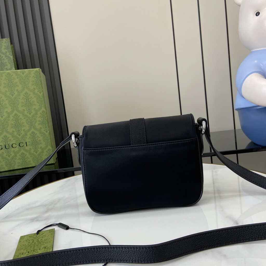 Gucci Mini GG crossbody bag ‎802100 in black GG canvas