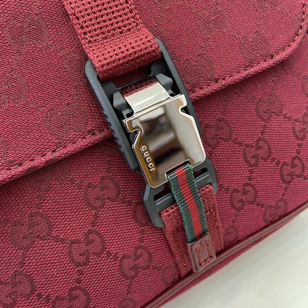 Gucci Mini GG crossbody bag ‎802100 in red GG canvas