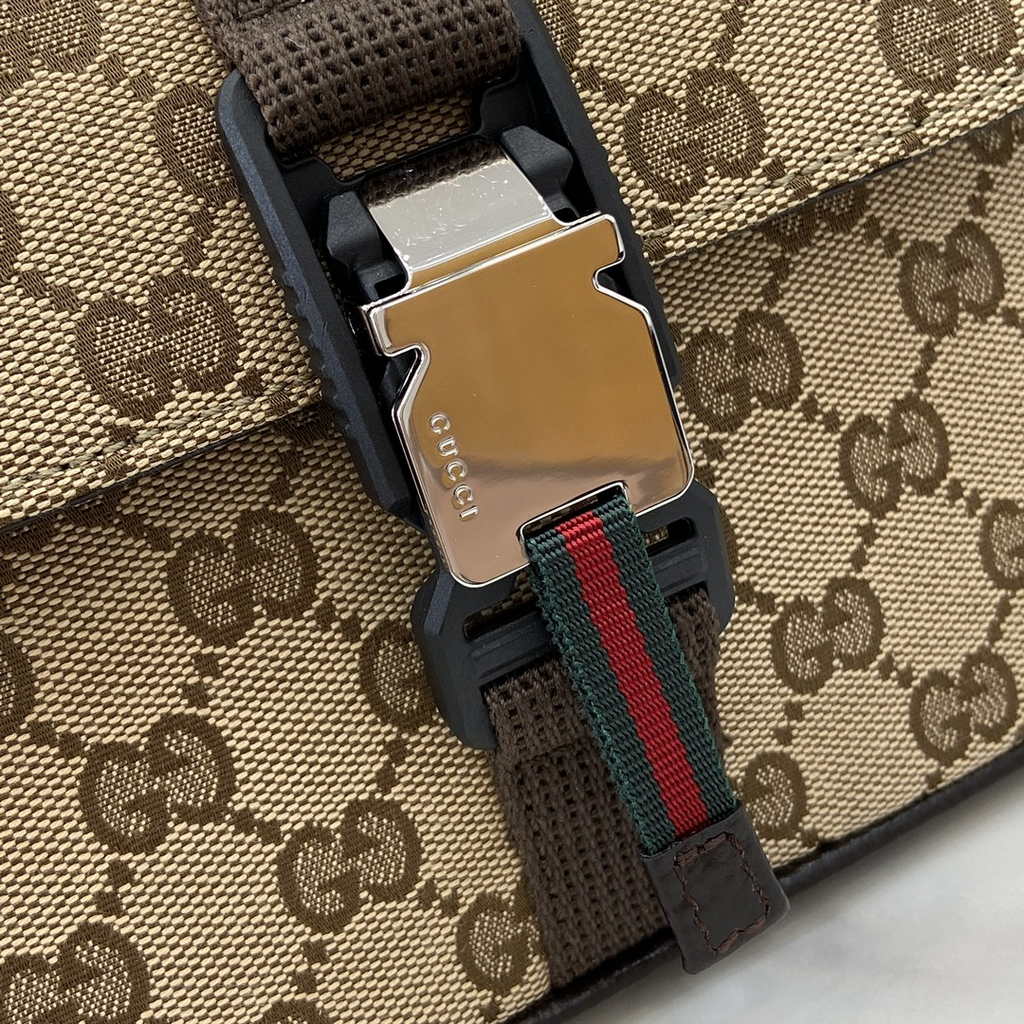 Gucci Mini GG crossbody bag ‎802100 in dark brown GG canvas