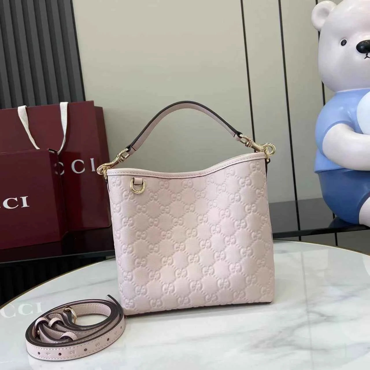 Gucci GG Emblem small bucket bag 815118 in Light Pink leather