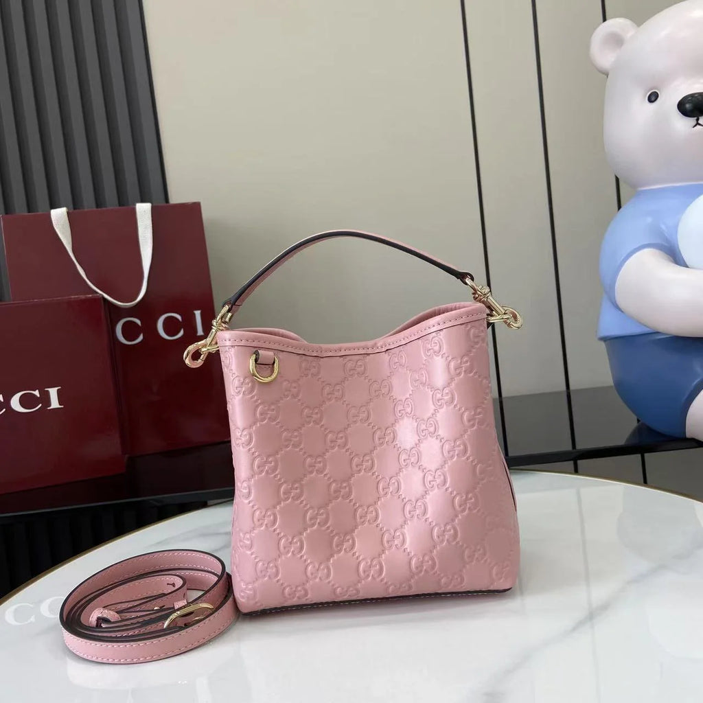 Gucci GG Emblem small bucket bag 815118 in GG Pink leather
