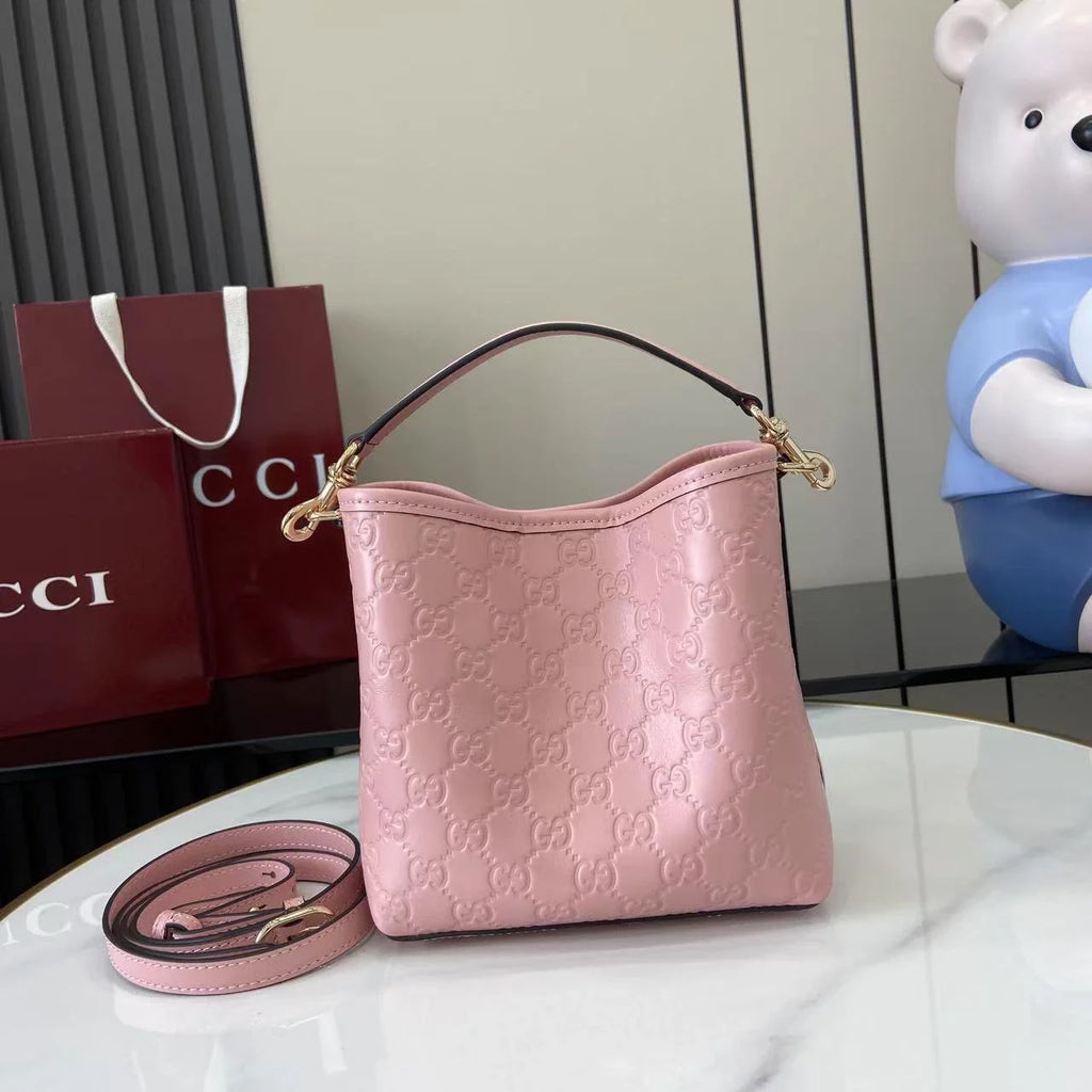 Gucci GG Emblem small bucket bag 815118 in GG Pink leather