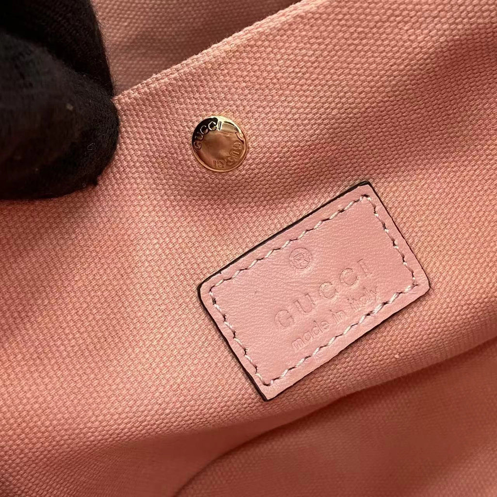 Gucci GG Emblem small bucket bag 815118 in GG Pink leather