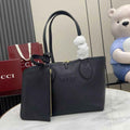 Gucci Totissima small reversible tote bag in black leather ‎839124