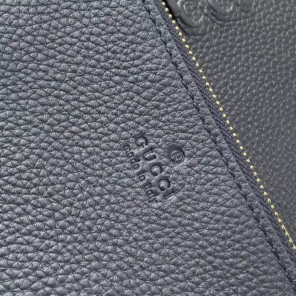 Gucci Totissima small reversible tote bag in black leather ‎839124