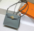 Hermès Kelly Danse II blue green Evercolor leather with gold