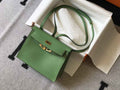 Hermès Kelly Danse II light green Evercolor leather with gold