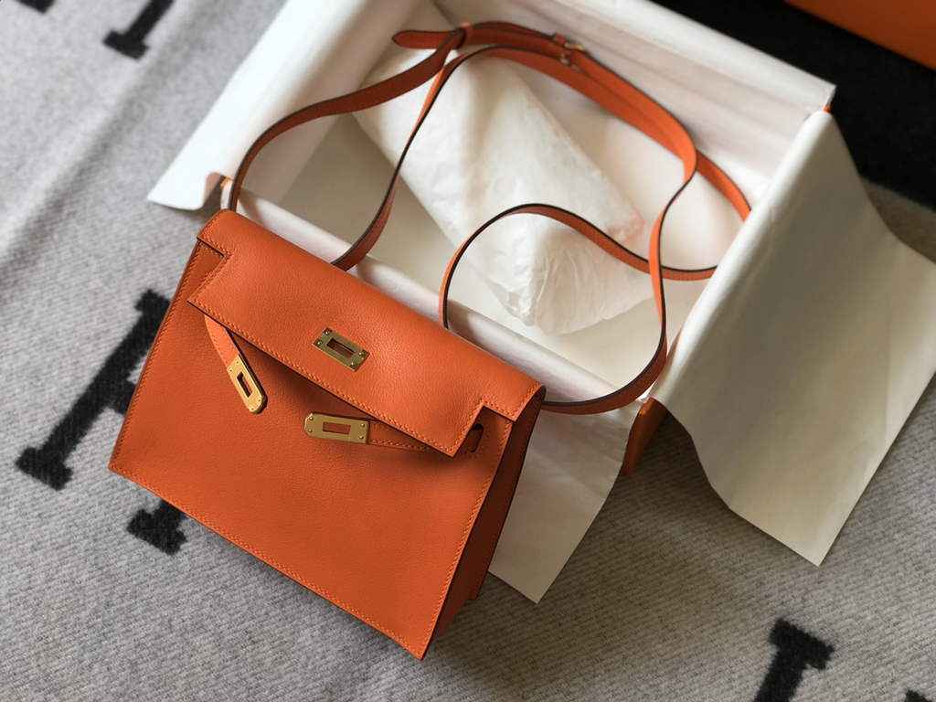Hermès Kelly Danse II orange Evercolor leather with gold