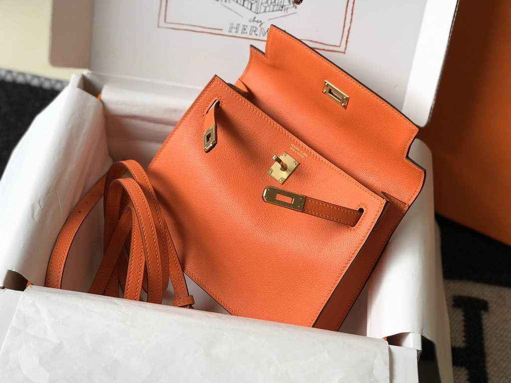 Hermès Kelly Danse II orange Evercolor leather with gold