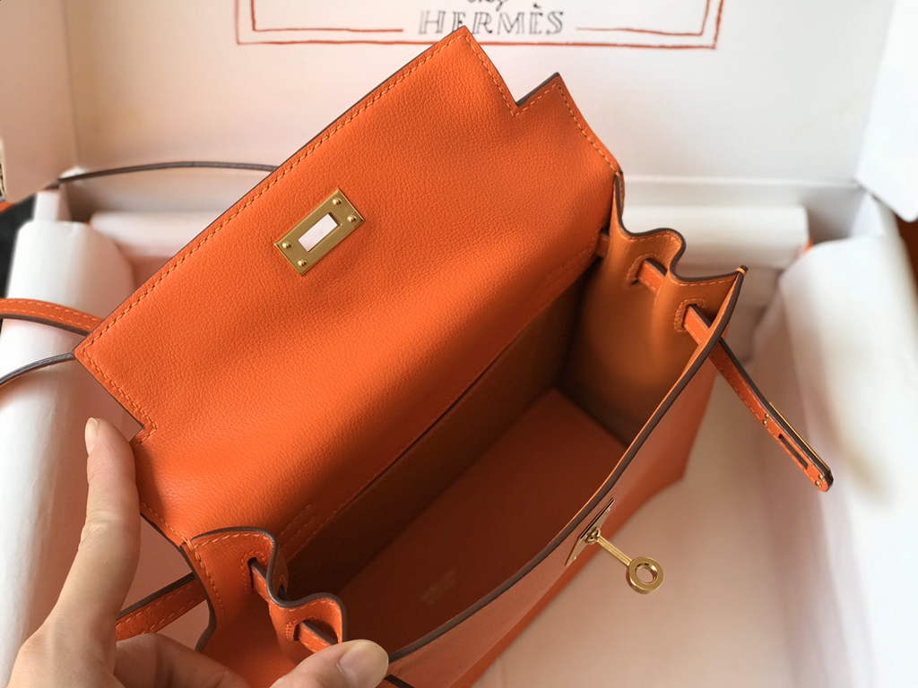 Hermès Kelly Danse II orange Evercolor leather with gold