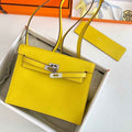 Hermès Kelly Danse II lemon yellow Evercolor leather with silver
