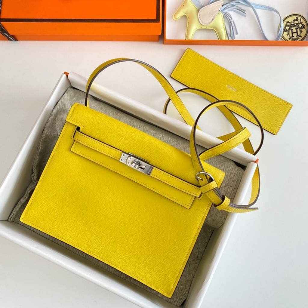 Hermès Kelly Danse II lemon yellow Evercolor leather with silver